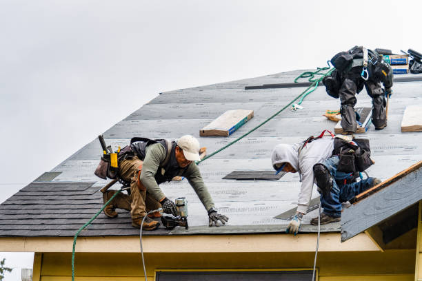 Professional Roofing technician working in North Branford, CT